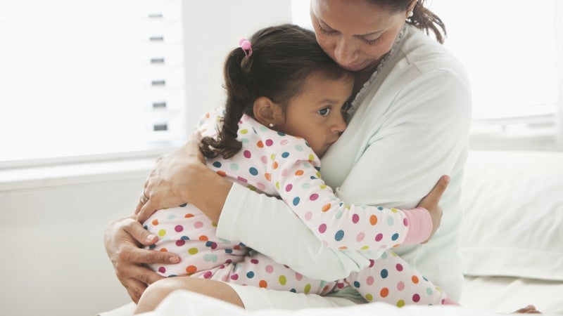 Mor och dotter i sjukhussäng